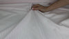 Pinstriped cotton shirting in pink on white