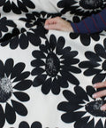 Black and white daisy print cotton piqué