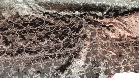 Embroidered velvet coating