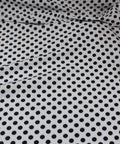 Navy and white polka dot cotton shirting