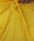 Bright yellow cotton lawn