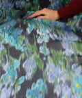 0scar silk gazar in a floral print that is watery and abstract